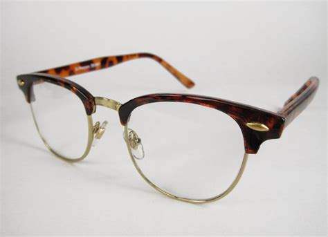 tortoise shell horn rimmed glasses|shell used as a trumpet.